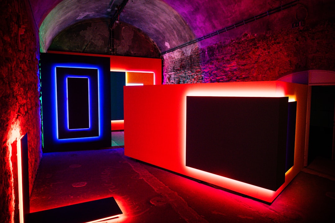 Modern room with neon lights and red counter