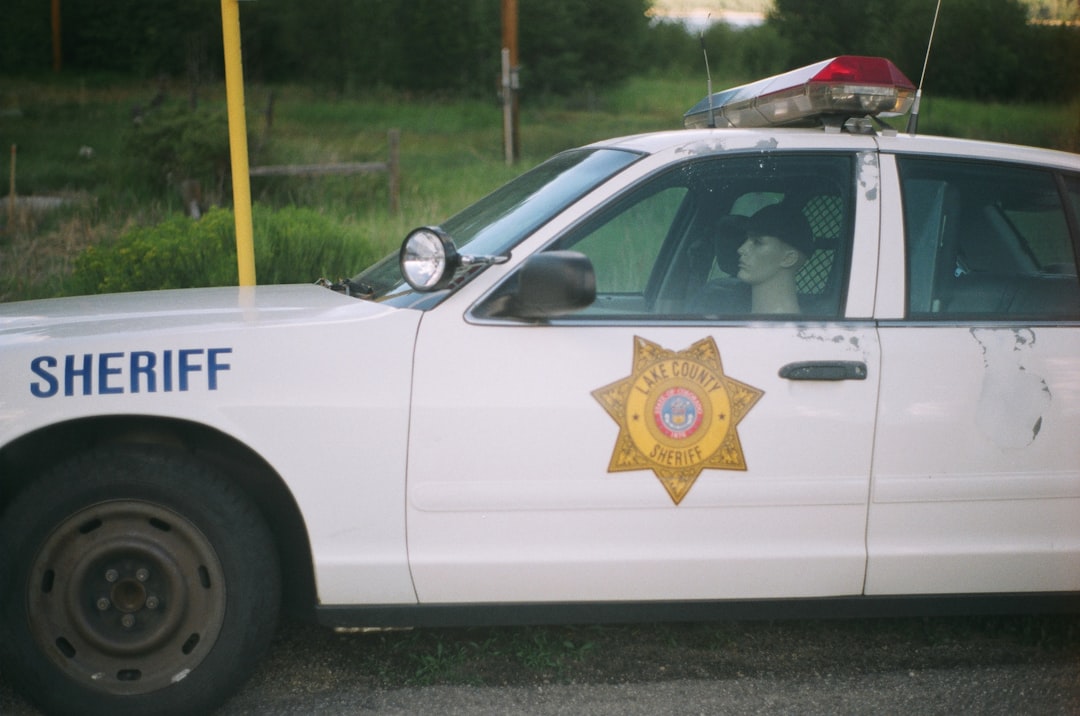 white Sheriff car