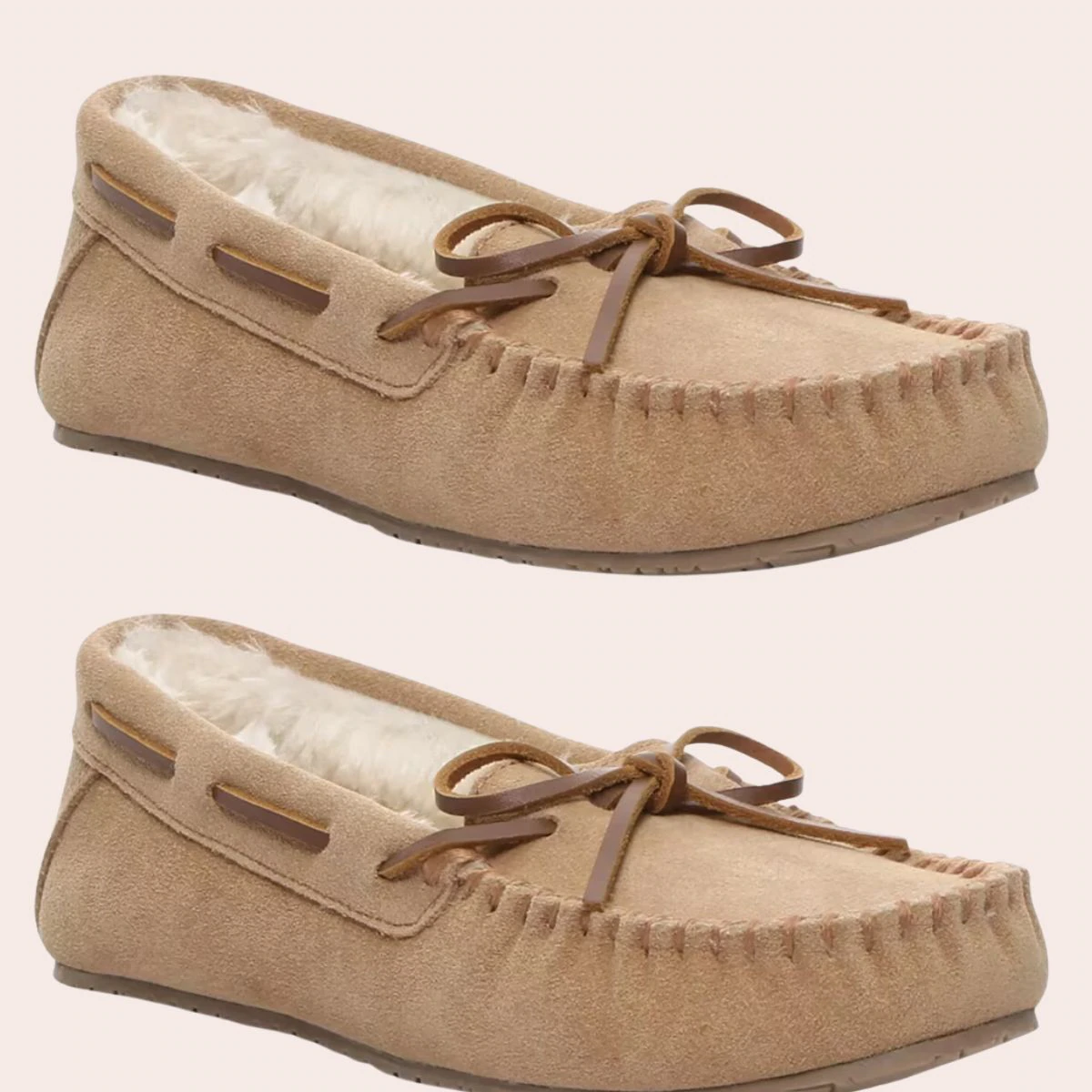 Уютные тапочки-мокасины Minnetonka на мягкой поверхности